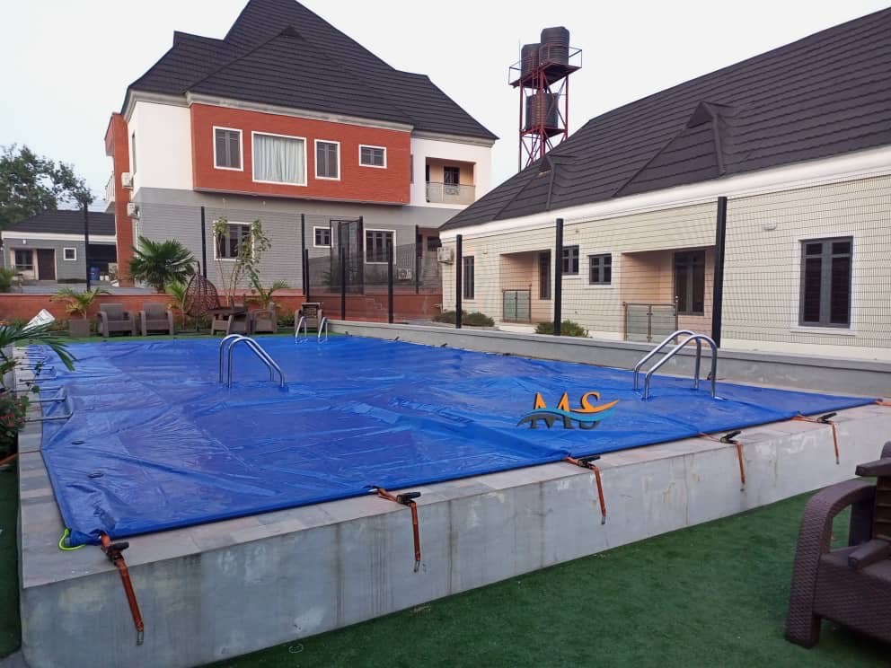 Close-up of an automated pool cover in action